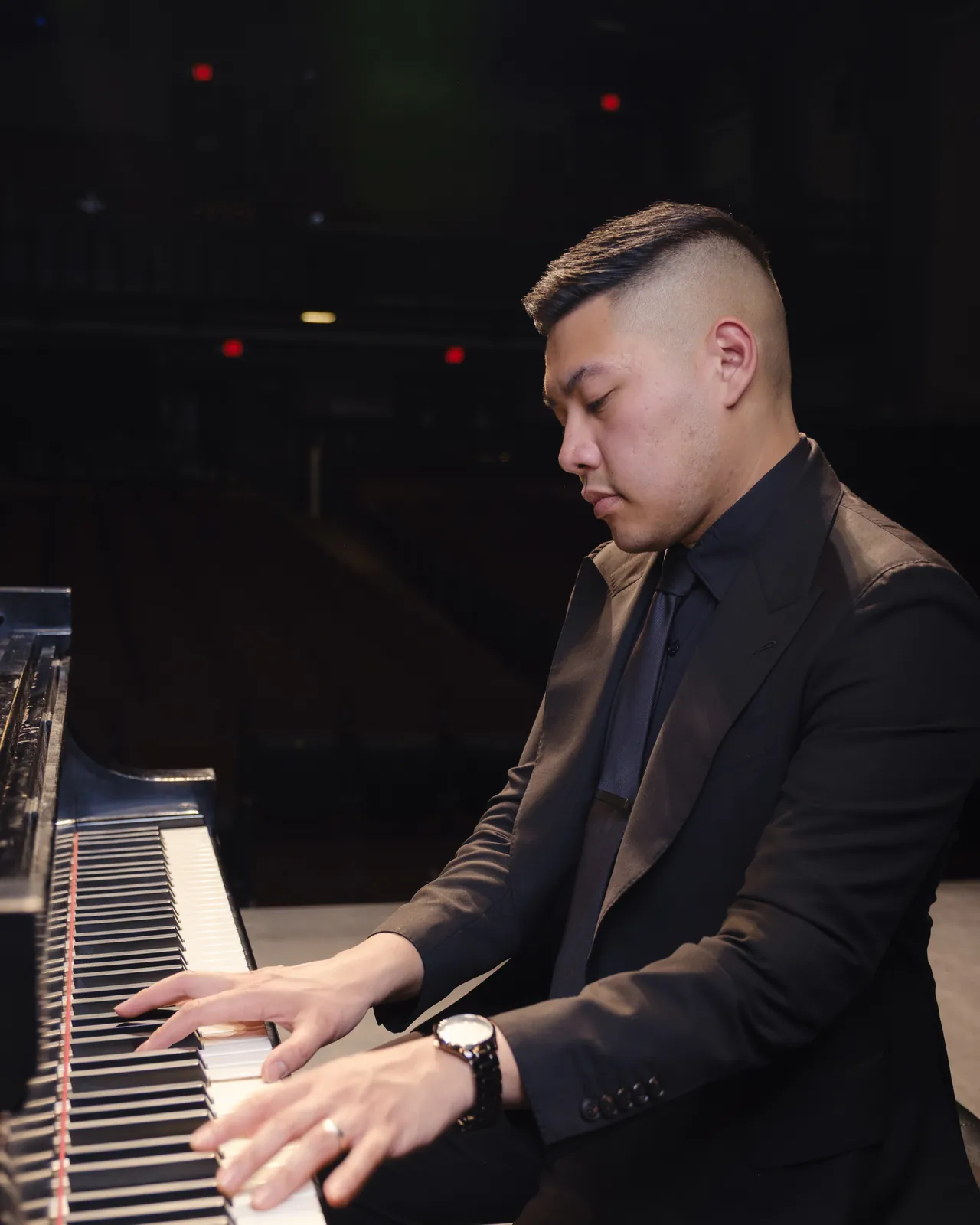 Isaac playing, focused on the keys